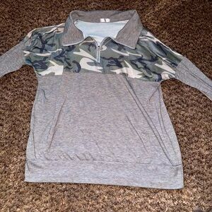 Woman’s crew neck sweater.